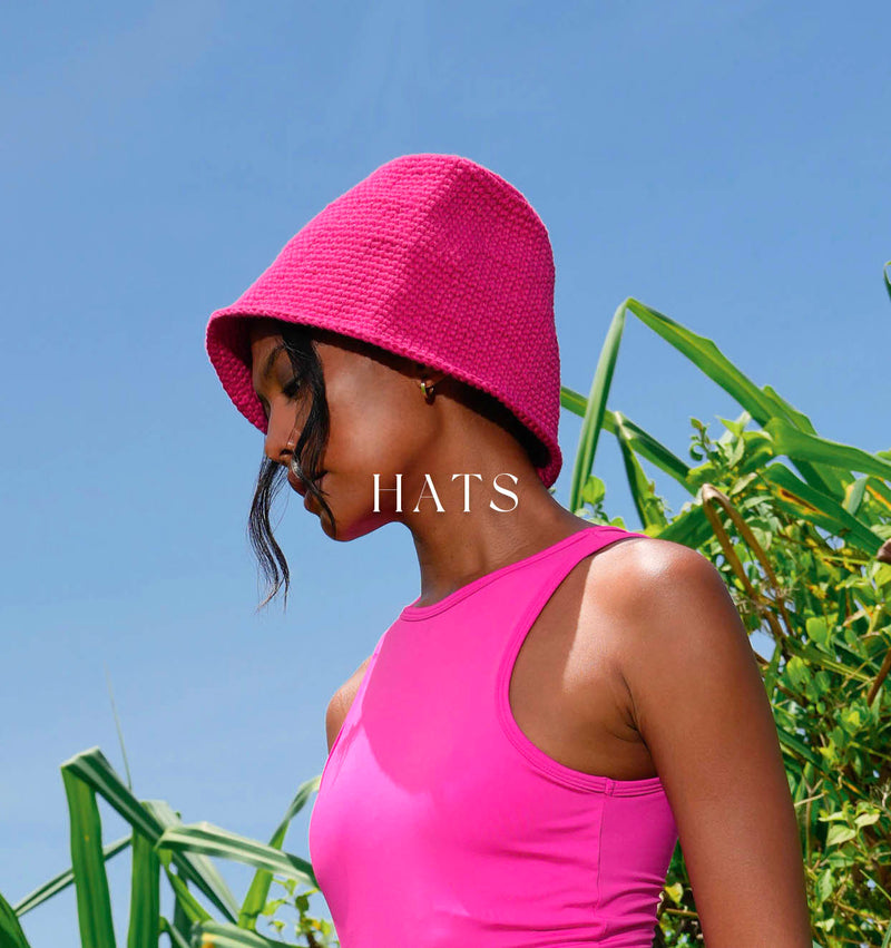 BrunnaCo Gani Crochet hat in Hot Barbie Pink color made by female artisans in Bali. Click to view BrunnaCo's hats & straw hats collection