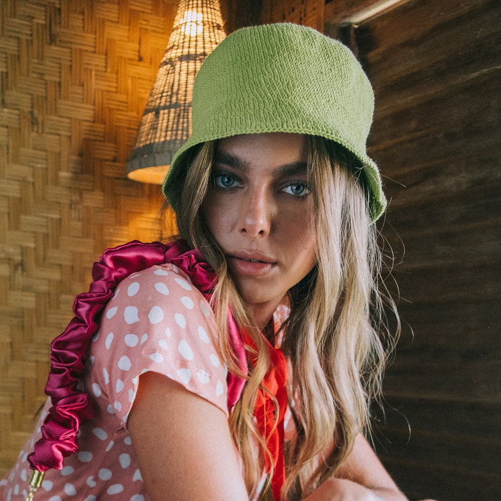 Florette Crochet Bucket Clochet hat in Lime Green. Soft and shapeable crochet bucket hat meticulously made by artisans in the villages of Bali. This hat feels airy for summer days and offers irreplaceable comfort at any season of the year.