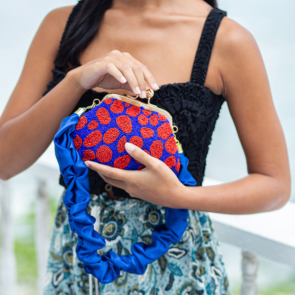 BrunnaCo Arnoldi Mandy Beaded Polka Dot clutch bag in Red and Blue
