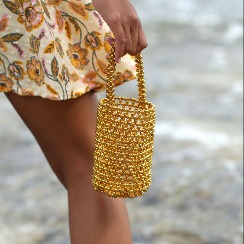 GOLDA Metallic Beads Bucket Bag In Gold