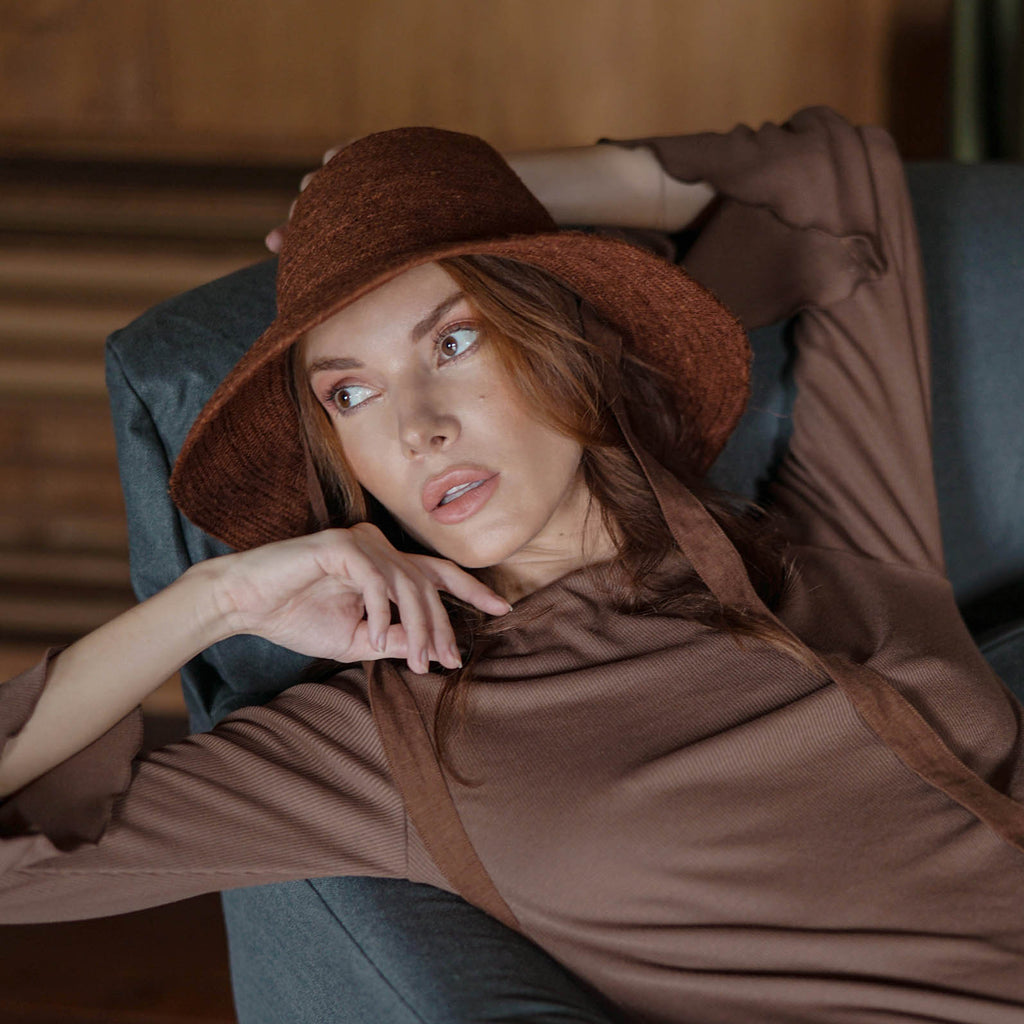 Meg Jute Straw Beach Hat in Burnt Sienna. Beautifully crafted with a tall crown shape and medium-width brim to bring back the effortless classic charm. Take this hat to your next outdoor adventure or simply style up your daily grocery shop trips!