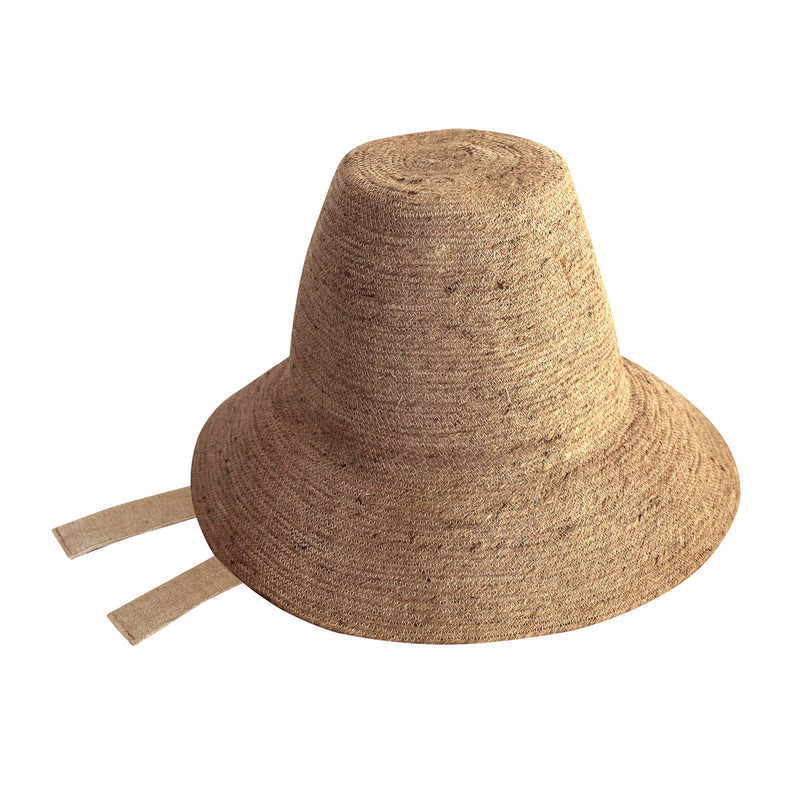 Meg Jute Straw Hat in Beige. Beautifully crafted with a tall crown shape and medium-width brim to bring back the effortless classic charm. Take this hat to your next outdoor adventure or simply to style up your daily grocery shop trips!