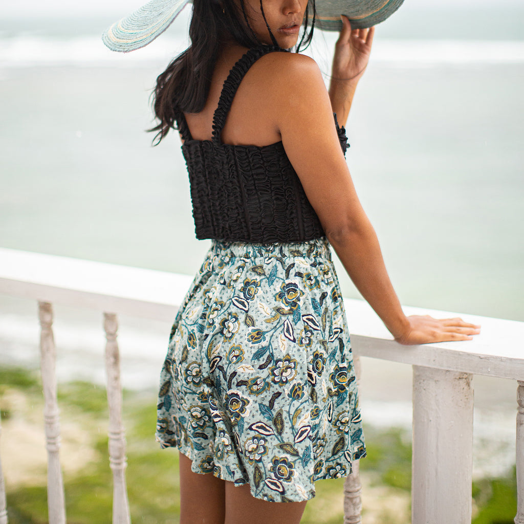 SEKAR Floral Batik Shorts in Sea blue  is made entirely from a relaxed, lightweight cotton fabric fit for every warm-weather destination. With the drawstring waist, wear SEKAR both low and high-rise. As seen on our lookbook, style SEKAR with our MARIGOLD Hand-embroidered Bralette Top and AMORA Frayed Straw Hat.