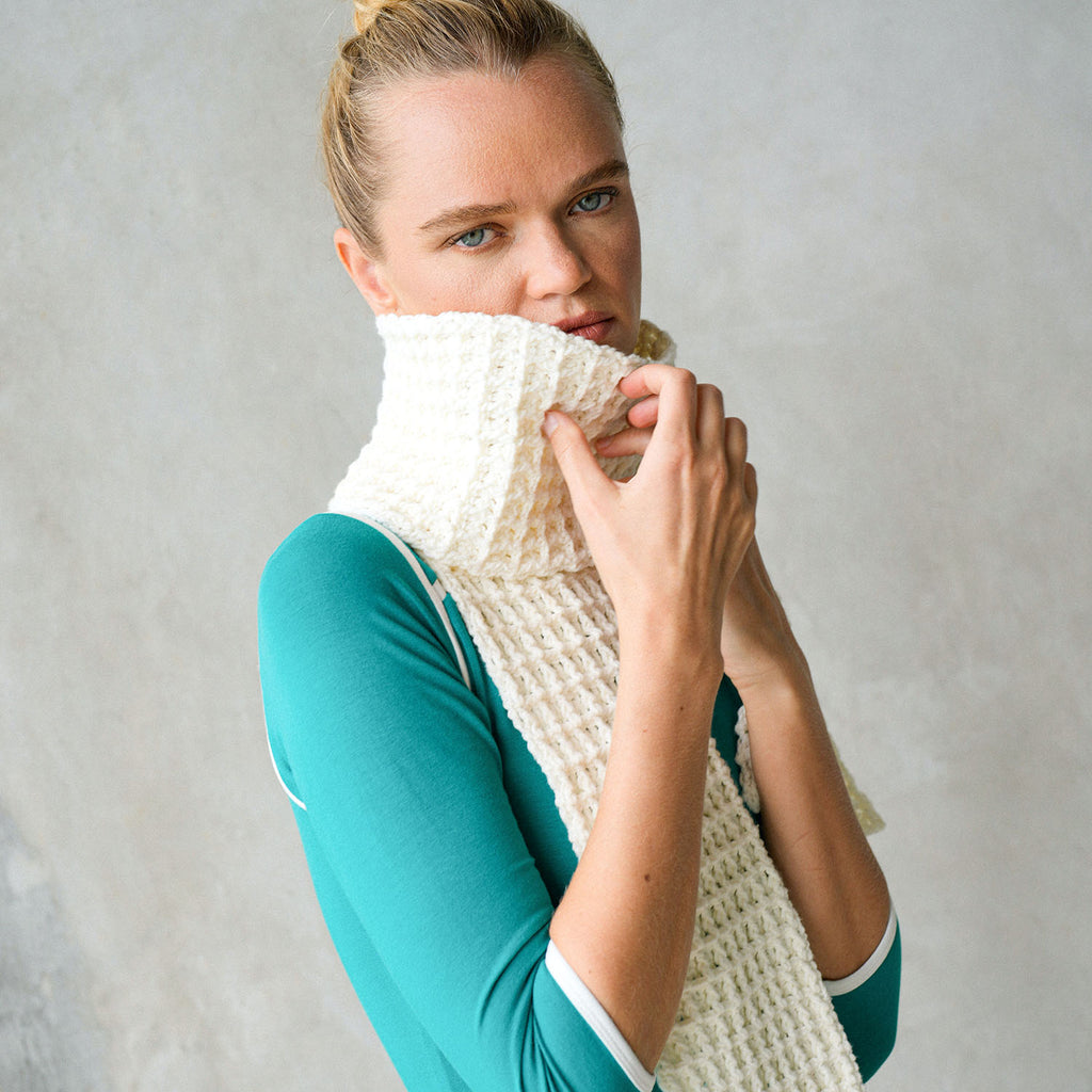 As warm as morning waffles ~ BrunnaCo's WAFFLE Crochet Scarf has a cozy and buttery-soft texture that makes you want to wear it everywhere when the temperature gets cold. It's hand-crocheted in waffle pattern with sumptuous cotton yarn by our female artisans in Java who put so much love into this piece. Wrap it around your neck twice or let it drape loosely over the lapels of your coat.