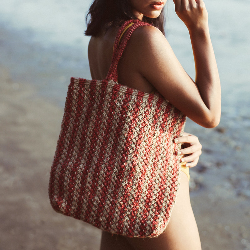 BrunnaCo Louisa Jute Tote Beach Bag. This beautiful striped tote bag in red and beige is handmade by artisans in Bali