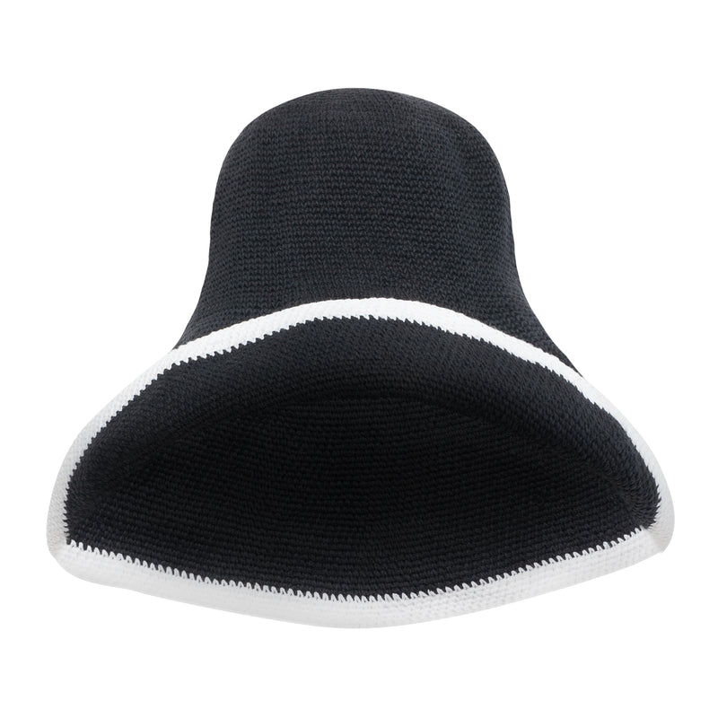 aBloom Line Crochet hat in Black. Soft and shapeable crochet hat inspired by the classic Calla Lily flower shape. Meticulously made by artisans in the villages of Bali. Its light and semi-floppy construction make it the perfect hat for picnics at the beach or poolside any season of the year.