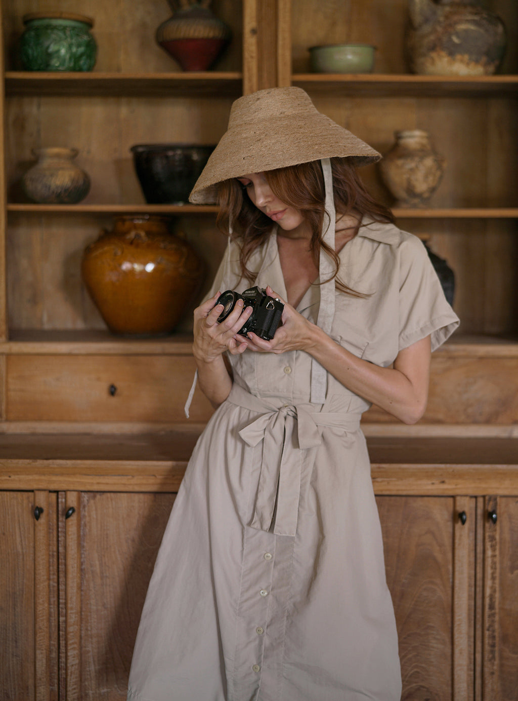 Reign Jute Straw Hat in Nude Beige. REIGN is a classic multi-functional hat with downturned brim made with natural jute straw and a modern structural shape. This hat is made to accompany you from the great outdoors to chic dinner and anywhere you travel in between.
