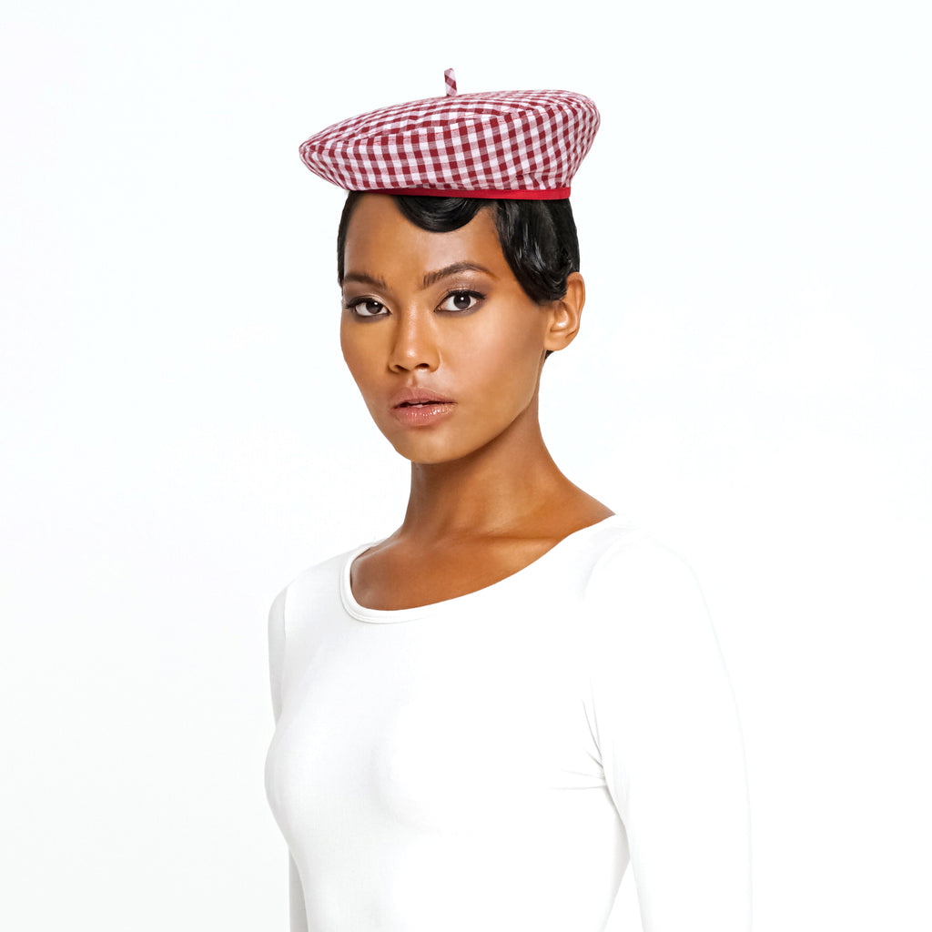BrunnaCo Simone Beret Gingham Hat in Red, a stylish and sustainable beret hat made from soft gingham cotton with a comfy cotton lining. This 100% vegan and biodegradable hat is perfect for adding a touch of French flair to any outfit.